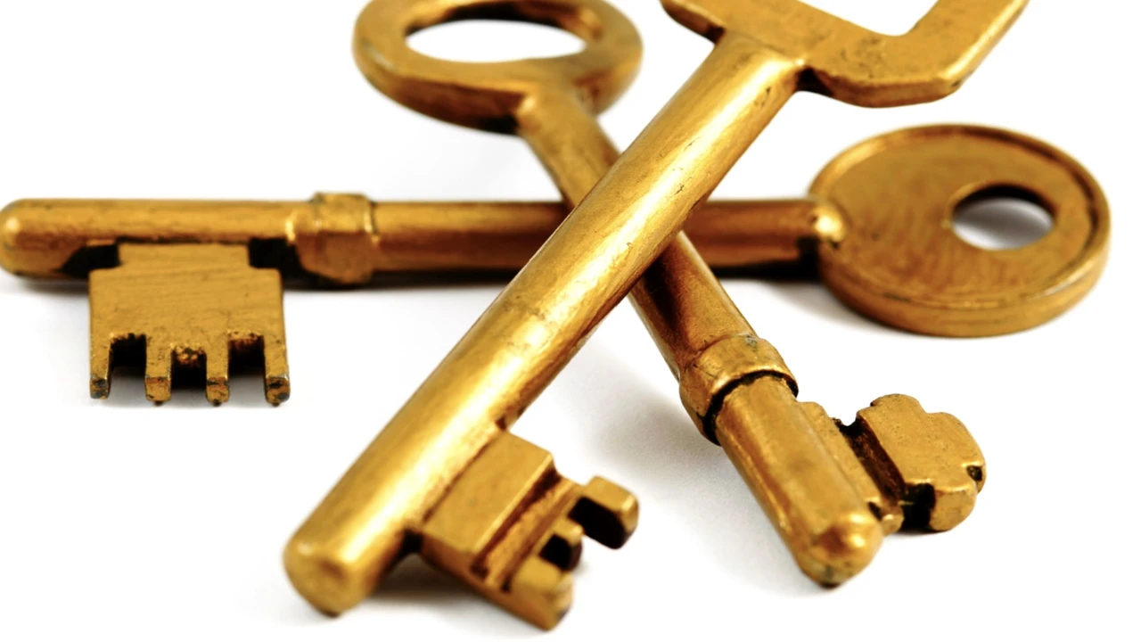 Close up on a plate of mashed potatoes, topped with baked pork chops with cream of mushroom soup, and a side of green beans.